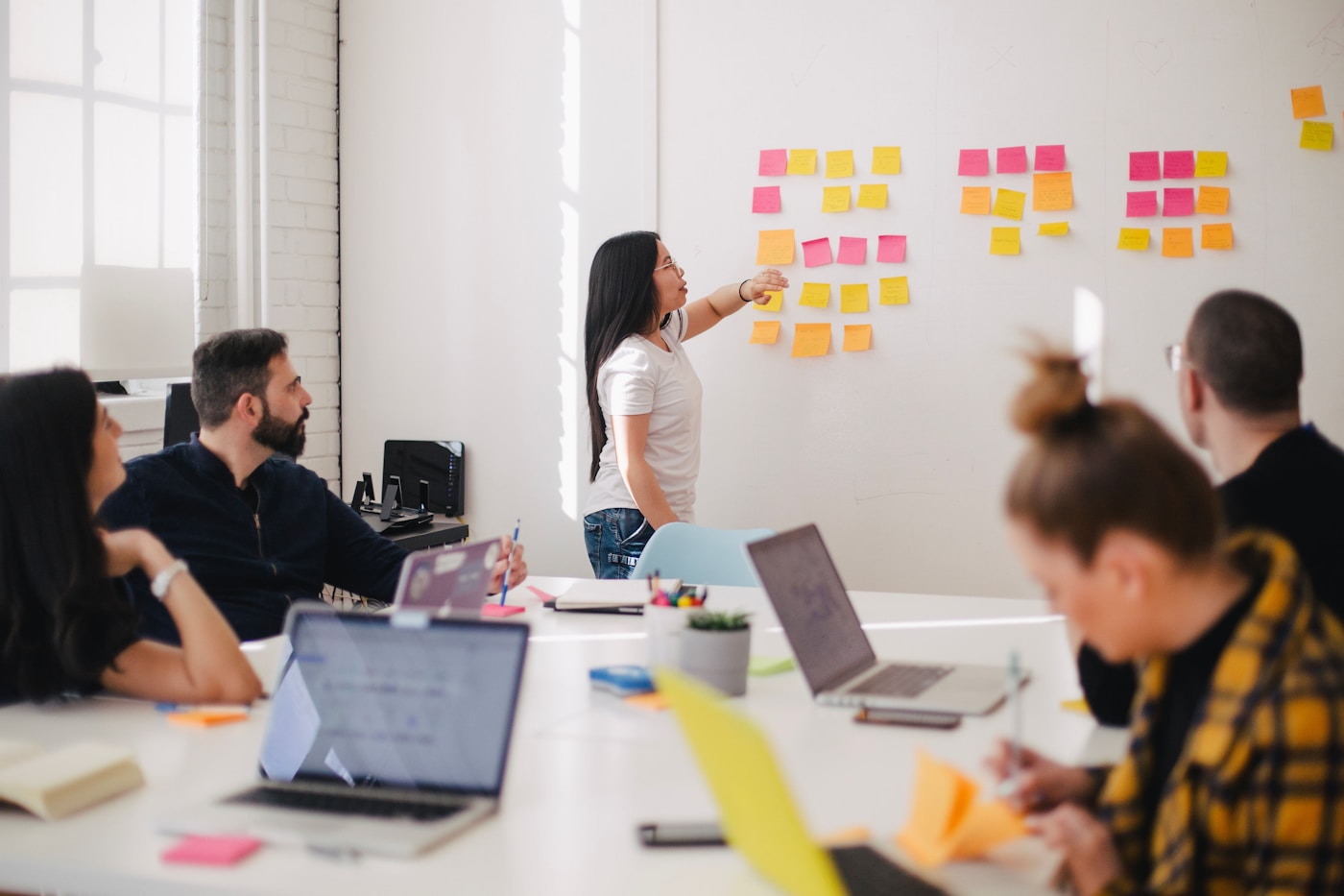 A team mapping a business workflow in a workshop